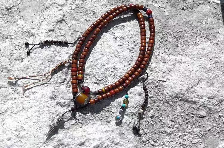 Tibetan Lhasa, coffee-colored yak bone rosary