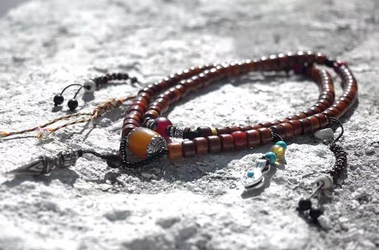 Tibetan Lhasa, coffee-colored yak bone rosary
